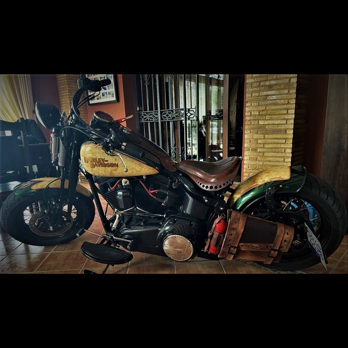 dhcustom brown leather saddlebag with fuel bottle